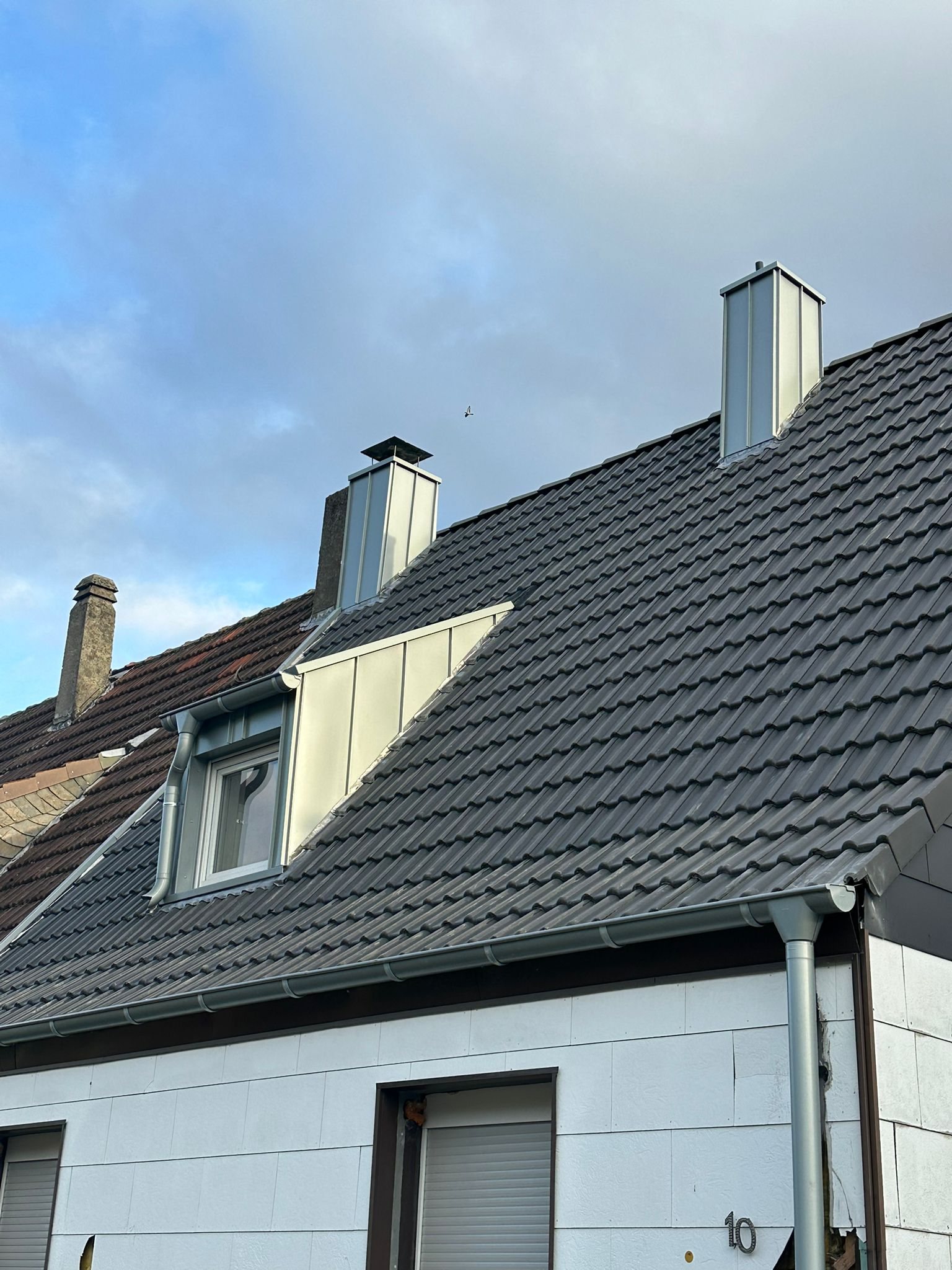Komplette Dachsanierung mit neuer Dacheindeckung und Spenglerarbeiten in Gelsenkirchen